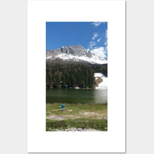 The fabulous alpine lake of Misurina in the Dolomites. Lovely and relaxing place in the Italian Alps. Chair on the shore. Reflections in the rippled water. Sunny spring day. Posters and Art